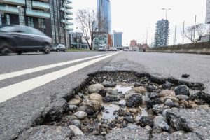 Buche-Milano-Asfalto